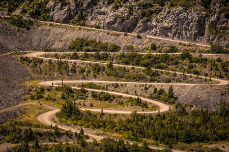 Road turns climbing a mountain in FutaleufÃº Hidroelectric plant, Chubut, Argentina.の写真素材