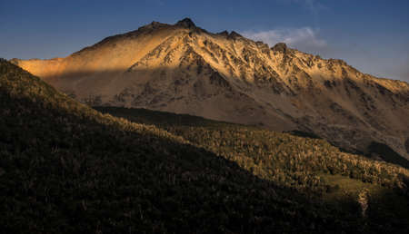 Last moments of sun in the afternoon at mountains in Pichi Traful, Nahuel Huapi National Park, Argentinaの写真素材