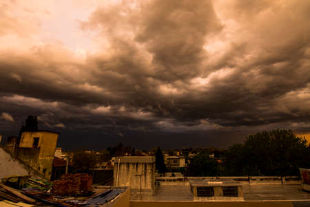 Stromy dark sky over terraces in Banfield city, Buenos Aires, Argentinaの写真素材
