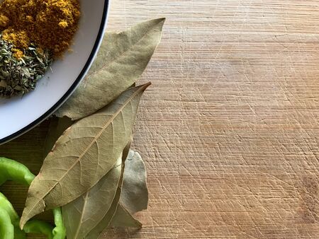 Laurel And Spices Top View. Mediterranean Wooden Food Table. Copyspace Vegetable Table.の写真素材