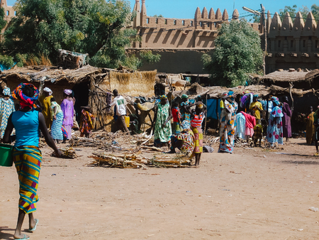Timbuktu, Mali, Africa - February 3, 2008: Street view of the city of Timbuktu in Mali Africa. on market day, where artisans and fishermen sell their productsのeditorial素材