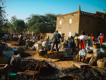 Timbuktu, Mali, Africa - February 3, 2008: People selling and buying at town marketのeditorial素材