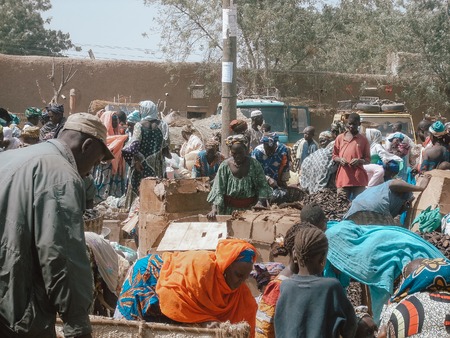 Timbuktu, Mali, Africa - February 3, 2008: People selling and buying at town marketのeditorial素材