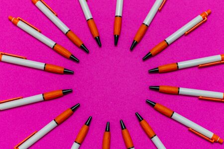 Group of pens on a coloured background, concept of an equal group colorfulの写真素材