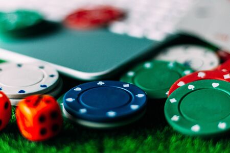 Internet gambling services. Betting on the Internet and winning money with games of chance. Play poker at home.の写真素材