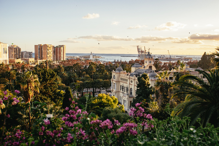 Sunset in Malaga. Mediterranean flair through buildings and flowers.の写真素材