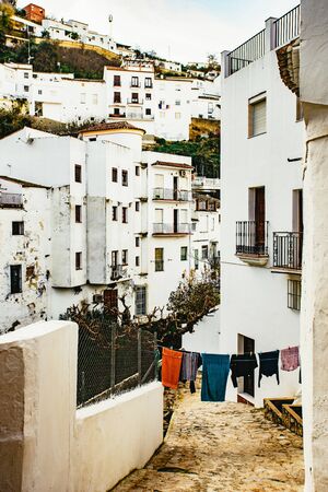 Narrow pedestrian lane between whitewashed housesの写真素材