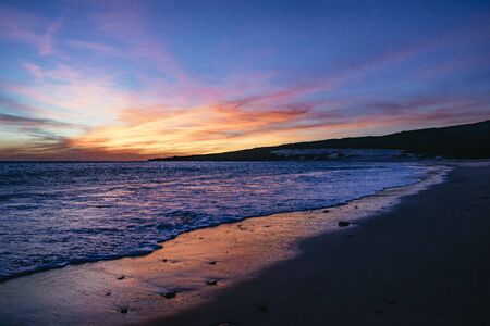 Vivid orange purple sunset over the ocean