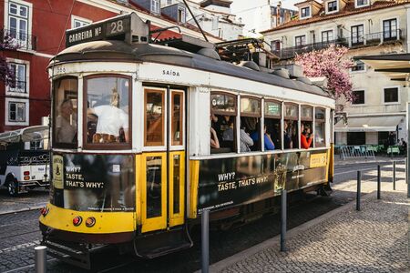City tram with advertising and passengersのeditorial素材