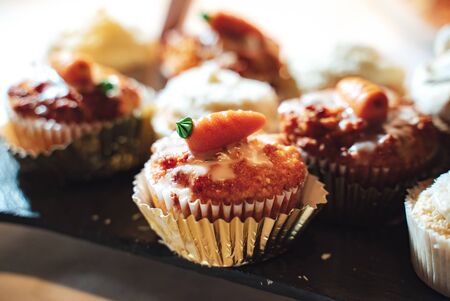 Cupcake or muffin decorated with a carrot