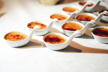 Small individual servings of creme bruleeの写真素材