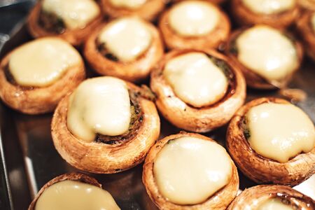 Grilled stuffed savory mushrooms with cheeseの写真素材