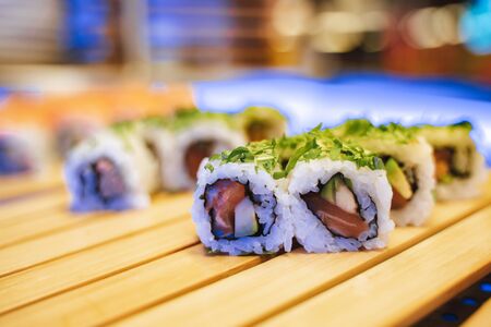 Fresh sushi rolls with tuna and avocadoの写真素材