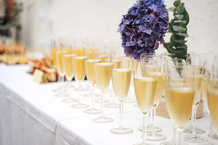 Glasses of champagne on table at wedding partyの写真素材