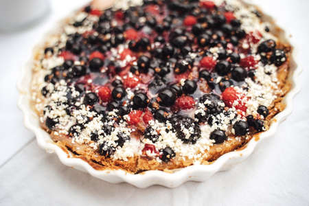 Close up of delicious tart with berries served at wedding partyの写真素材