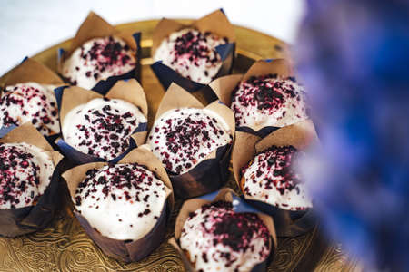 Close up of delicate delicious blueberry muffins served at wedding receptionの写真素材