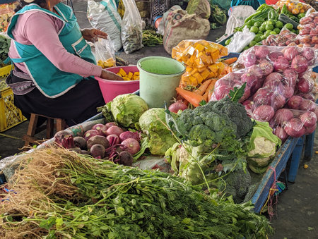 sale of fruits and vegetables in street market in ecuadorの写真素材