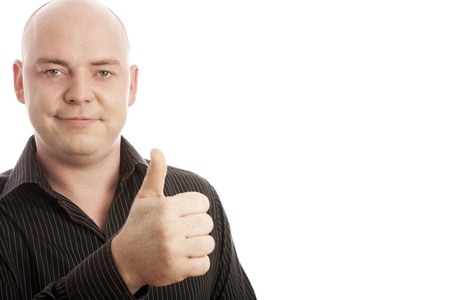 bald man in shirt thumb up and smilingの写真素材