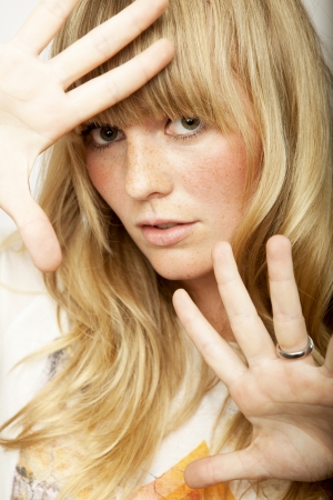 stunning blond long haired girl posingの写真素材