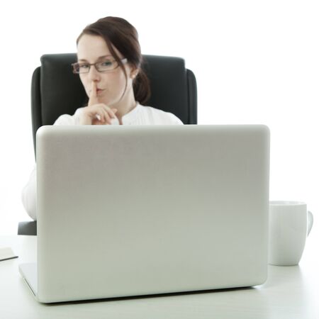 young brunette businesswoman with glasses sign quietの写真素材