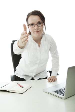young brunette businesswoman with glasses welcome youの写真素材