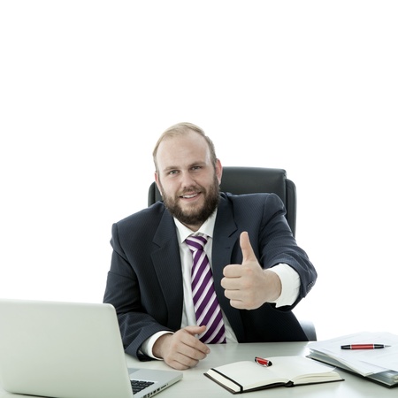 beard man thumb up at the deskの写真素材