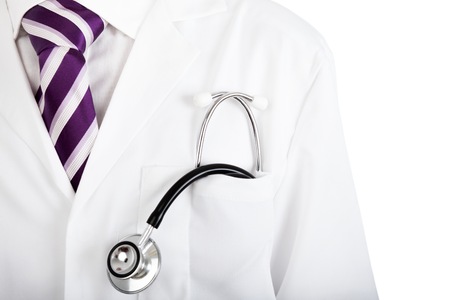 Doctor wearing a striped purple and white necktie with his stethoscope in his breast pocket, closeup view or the instrument, on white.の写真素材