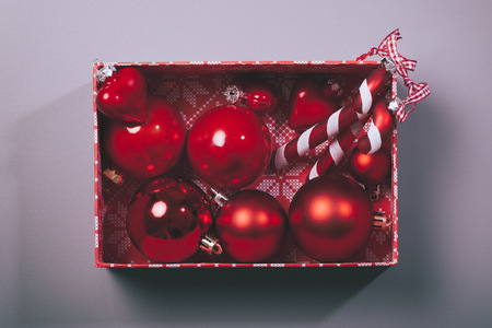 christmas ball box, with candy cane and ribbonの写真素材