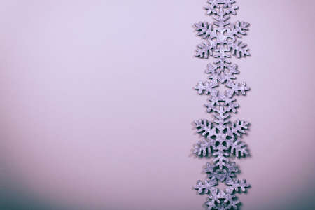 Christmas and New Years snowflake backgroundの写真素材