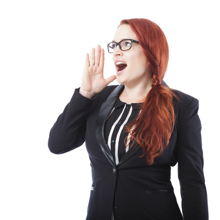 young beautiful business woman shout with hands on mouth, isolated on white backgroundの写真素材