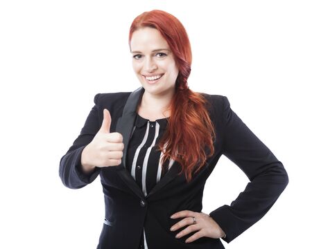 young beautiful business woman thumbs up and smile, isolated on white backgroundの写真素材
