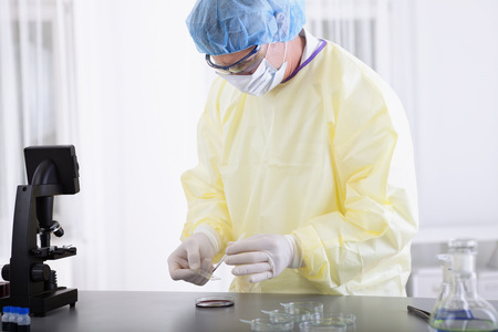 portrait of scientist or doctor in protective gear working in lab or laboratoryの写真素材