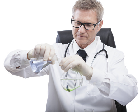 scientist or doctor is looking and analyse liquid test tube, in lab or hospitalの写真素材