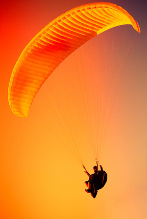 Paraglider flying at Zar Mountain Bielskoの写真素材