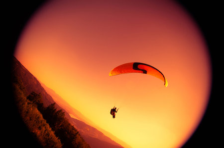 Paraglider flying at Zar Mountain Bielskoの写真素材