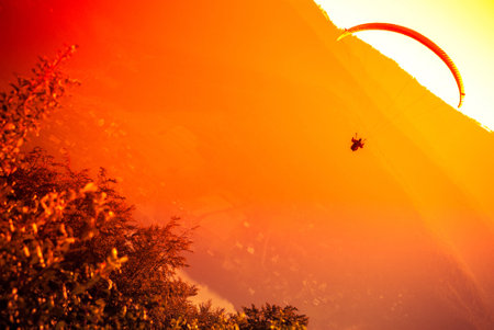 Paraglider flying at Zar Mountain Bielskoの写真素材
