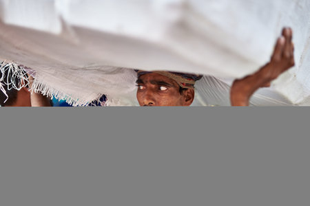 Unidentified indian man with traditional clothes at the local market.
