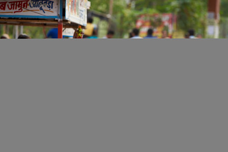 Unidentified people on the street in Kolkata. Kolkata is the most populous city in West Bengal.