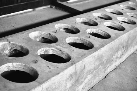 Close up of old and dirty concrete pipes. Black and white.のeditorial素材