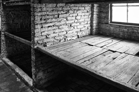 old room with brick wall and wooden floor, black and white photoのeditorial素材