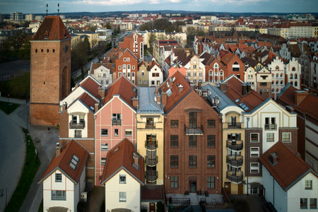 Colorful residential townhouses aerial view with red tile roofs historic market square medieval...