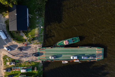 Overhead drone view ferry terminal complex with boats buildings and waterfront infrastructure transportation facilityの写真素材