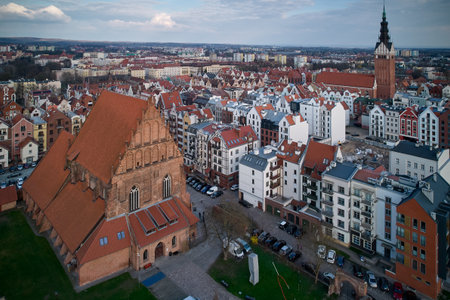 Medieval castle ruins and Gothic cathedral aerial view with brick architecture historic...