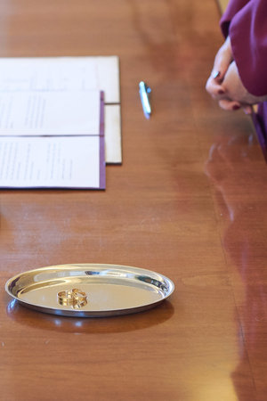 Gold Wedding Rings on Tray at Civil Registry Ceremony