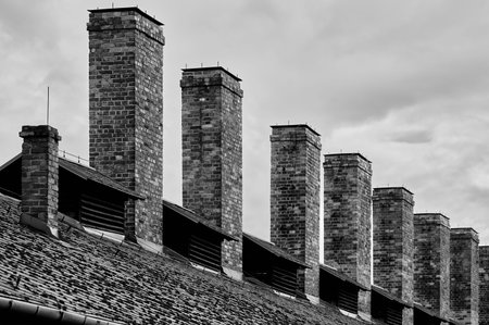 Brick chimneys on the roof of barracks at Auschwitz camp