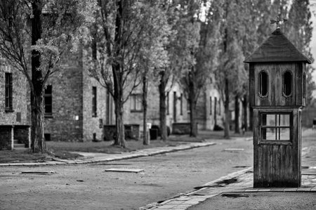 Wooden sentry box on path at Auschwitz concentration camp museum