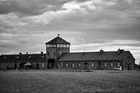 Main gate building of Birkenau camp under a cloudy skyのeditorial素材