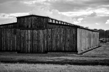 Large wooden barrack structure at Auschwitz Birkenau museumのeditorial素材