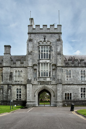 Stone archway and Gothic Revival facade of the Main Quadrangle at University College Cork, UCC, Cork City, County Cork, Ireland.のeditorial素材