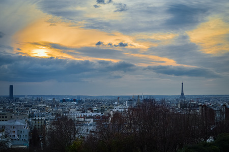 Paris skyline with Eiffel Tower and Tour Montparnasse at dusk in winter.の写真素材